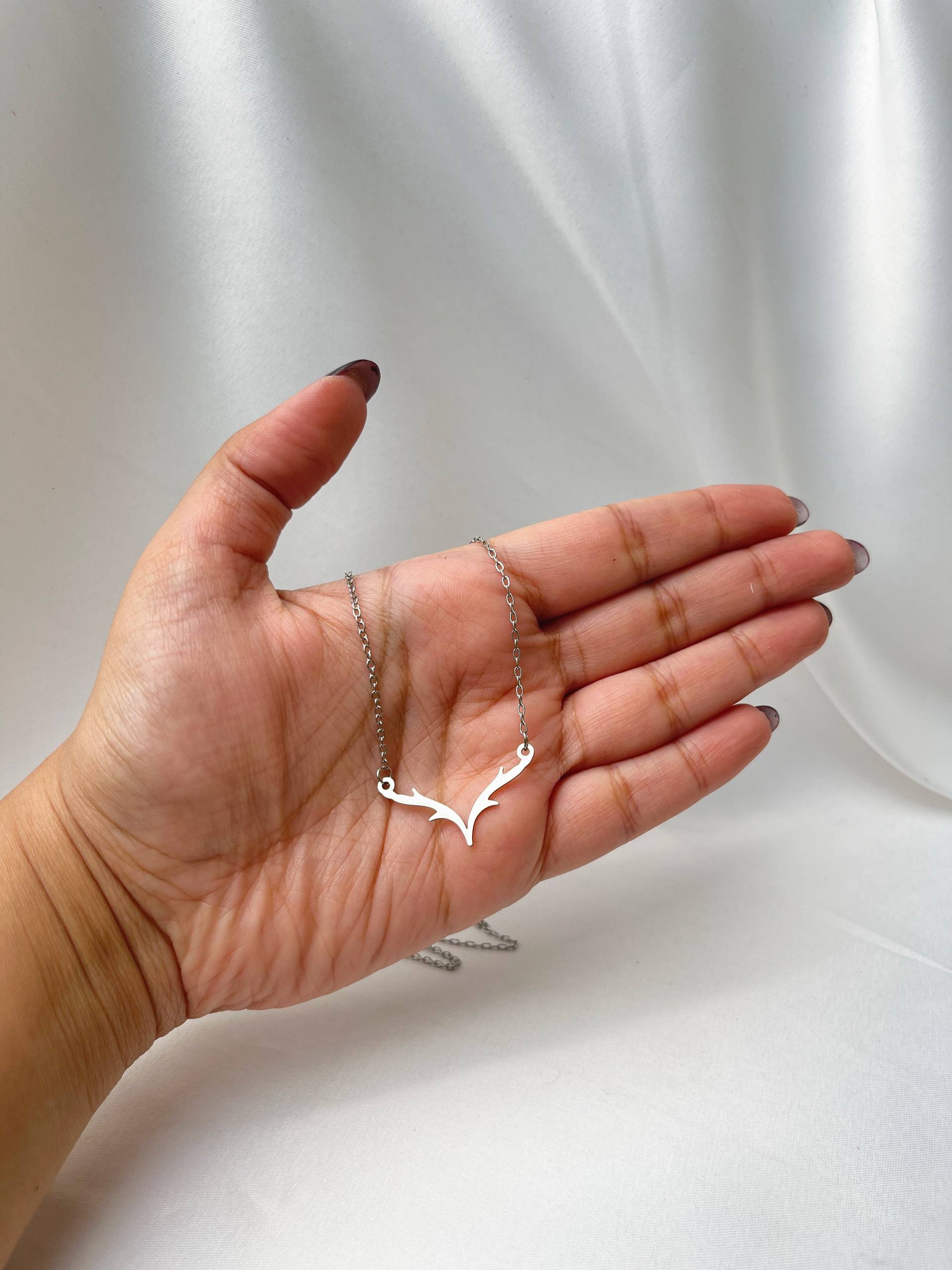 گردنبند استیل طرح بال طلایی و نقره‌ای کد68